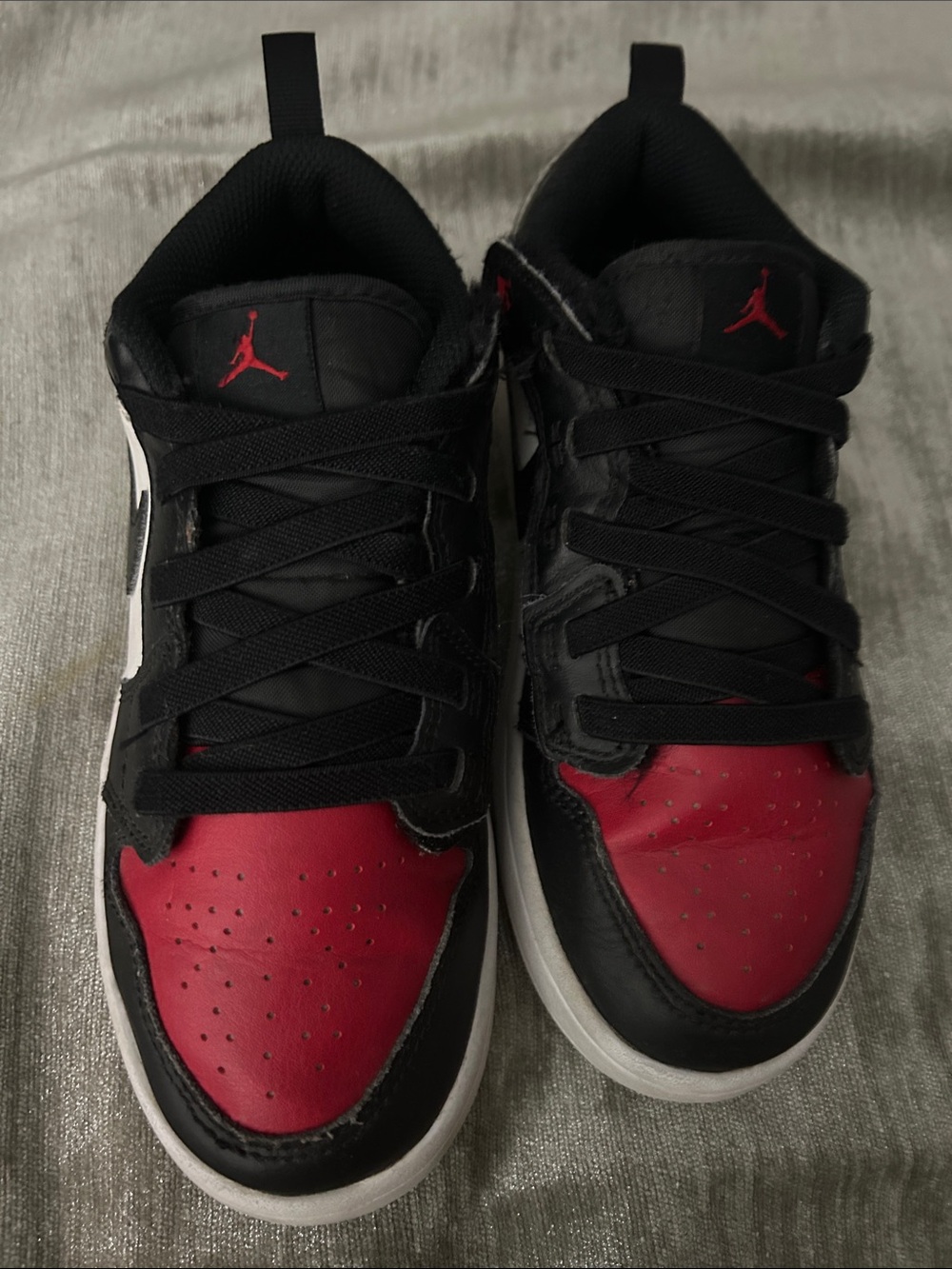 Nike Black and Red Low-Top Sneakers with Jumpman Logo